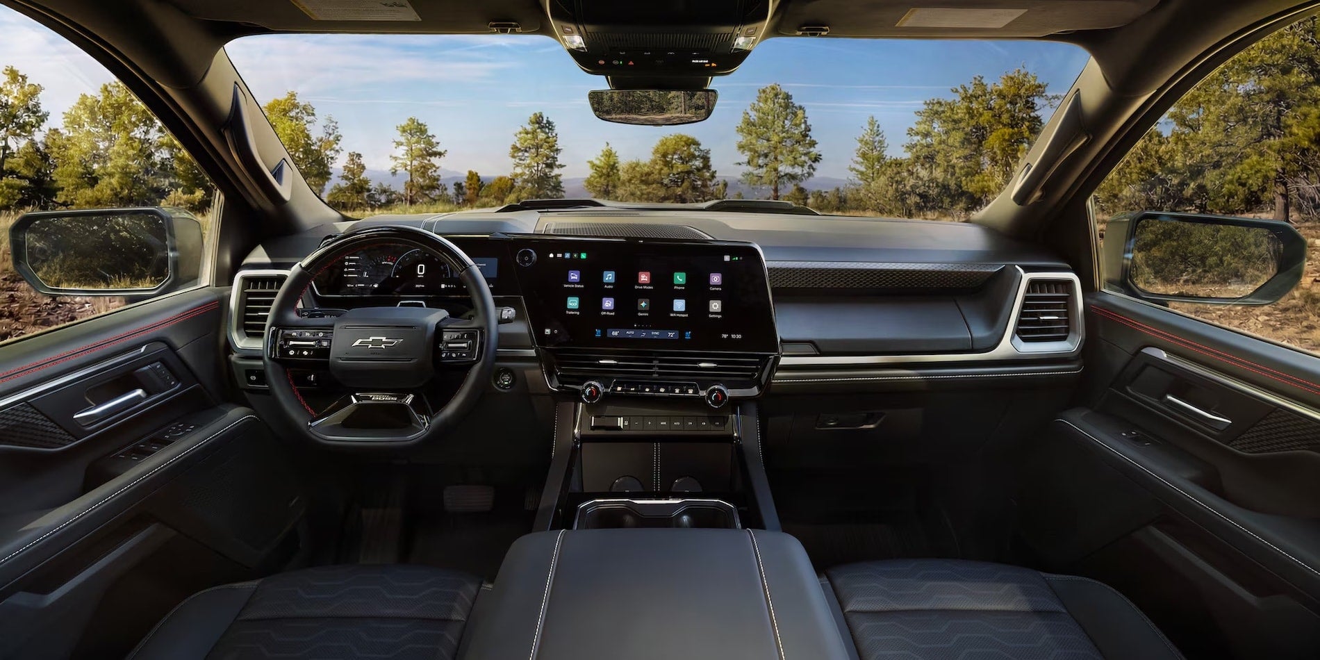 2027 Chevrolet Silverado 1500 Trail Boss interior with red stitching