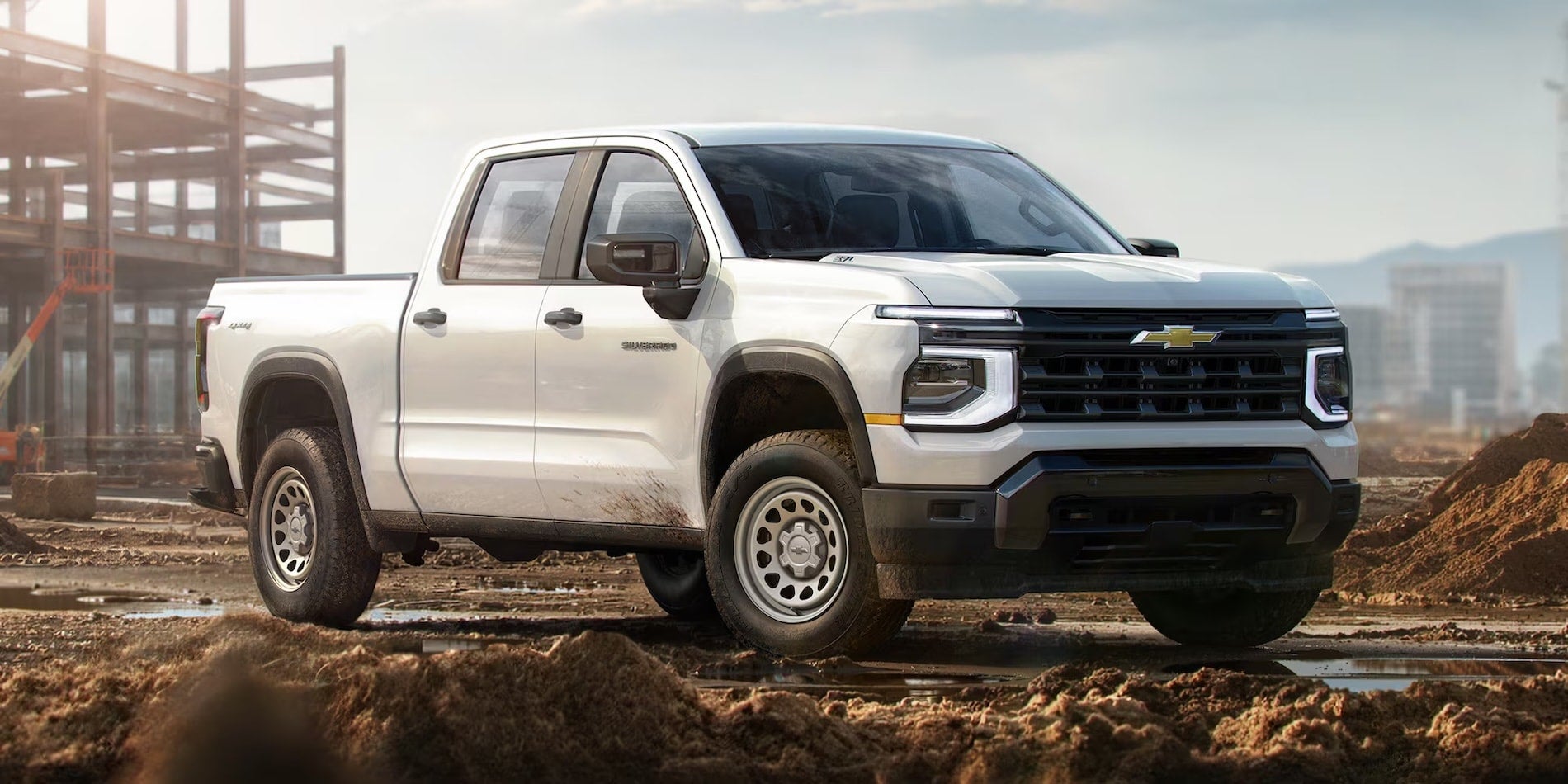 2027 Chevrolet Silverado 1500 Work Truck in Summit White at a construction site