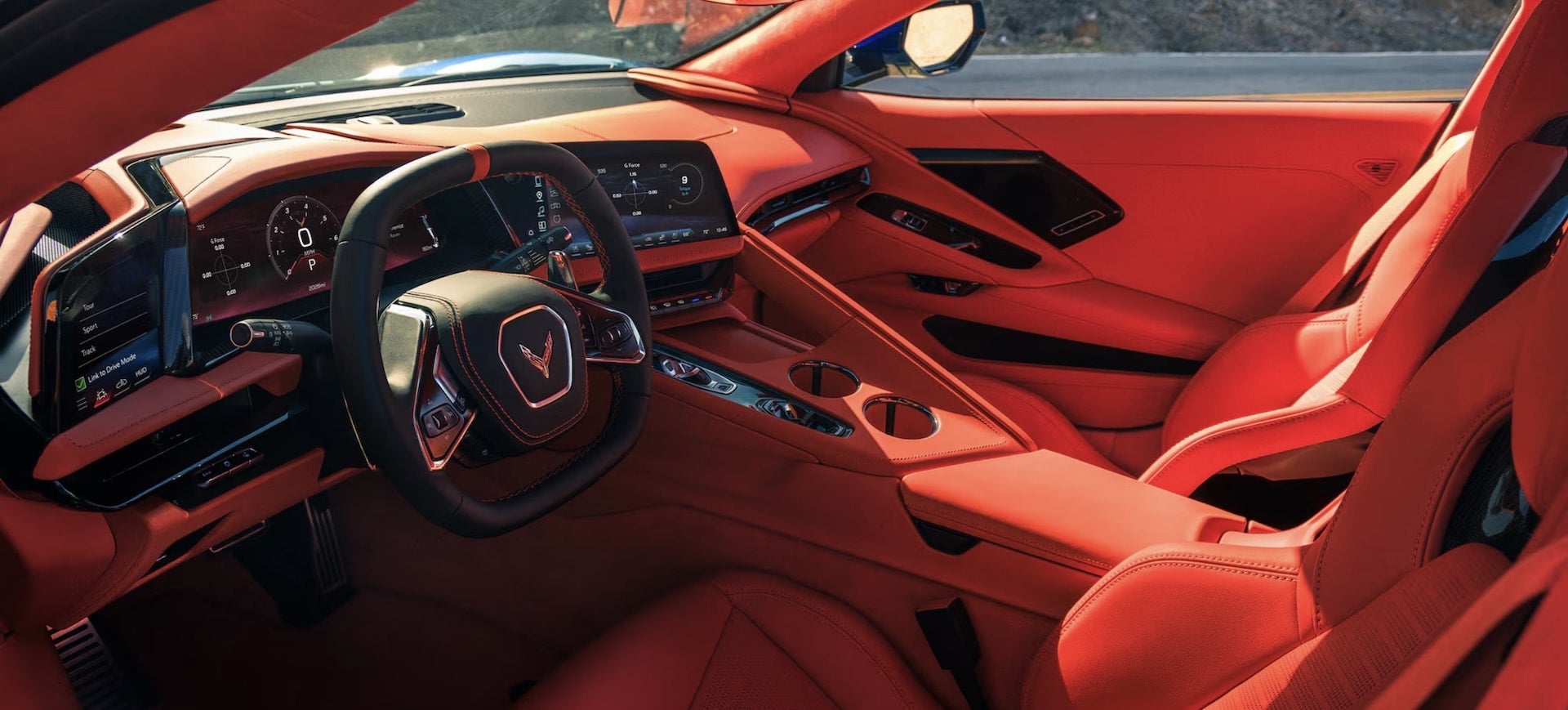 2027 Chevrolet Corvette Grand Sport interior, full cabin view with red leather seats, center console and steering wheel